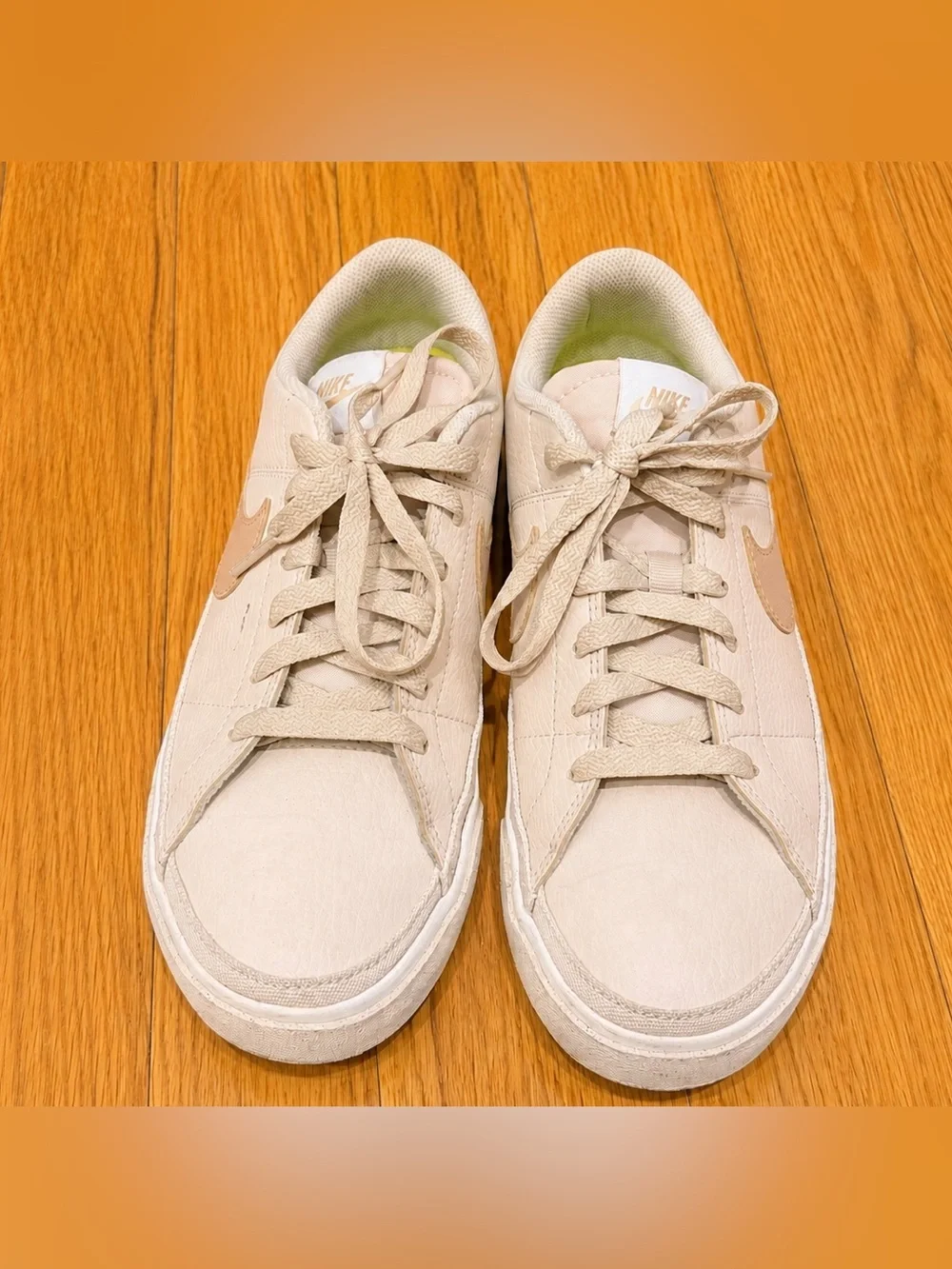 Nike Women’s Low-Top Sneakers in Cream with Tan Swoosh